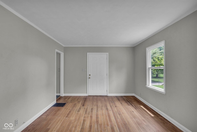 4708 Haverford Ave, Indianapolis, IN 46205 - empty room with wood-type flooring and crown molding