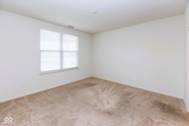 12820 Gloria Dr, Fishers, IN 46037 - empty room with light colored carpet and baseboards
