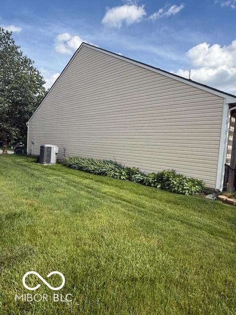 5304 Appleseed Way, Indianapolis, IN 46217 - view of side of property with a yard and cooling unit