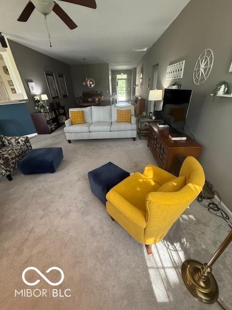 5304 Appleseed Way, Indianapolis, IN 46217 - carpeted living area with ceiling fan