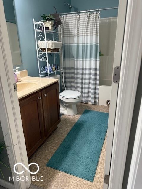 5304 Appleseed Way, Indianapolis, IN 46217 - full bathroom featuring vanity, toilet, and shower / bath combo