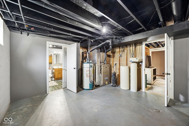 527 E 125 S, Williamsport, IN 47993 - unfinished basement with water heater, a water softener system, and heating unit