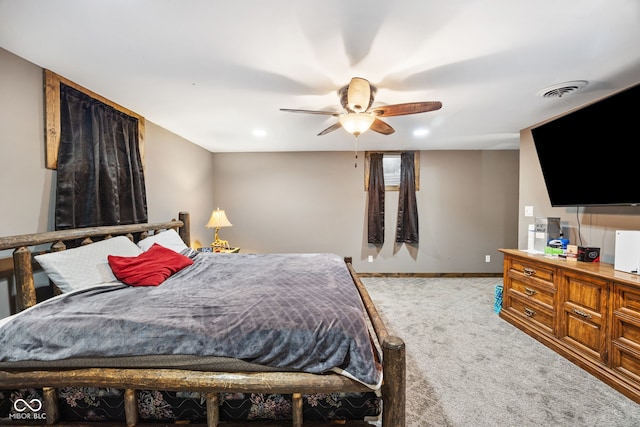 527 E 125 S, Williamsport, IN 47993 - bedroom featuring light carpet, baseboards, and a ceiling fan