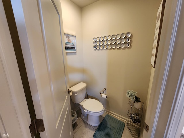 6731 Keepsake Dr, Whitestown, IN 46075 - bathroom featuring tile patterned flooring, toilet, and baseboards