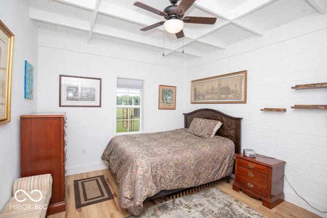 2640 E County Road 600 S, North Vernon, IN 47265 - bedroom with wood finished floors, beamed ceiling, a ceiling fan, coffered ceiling, and baseboards