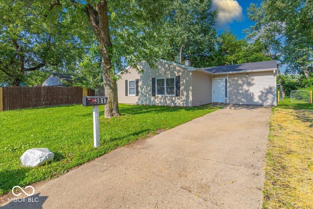 3817 Strathmore Dr, Indianapolis, IN 46235 - view of front of house featuring concrete driveway