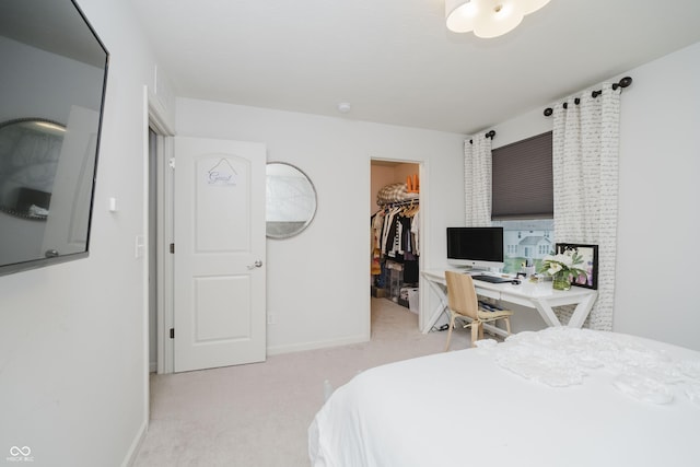 15598 Memorial Way, Fishers, IN 46037 - bedroom featuring light colored carpet, a walk in closet, and a closet