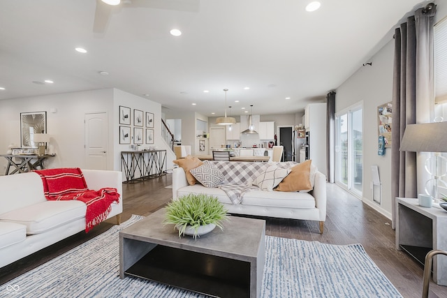 15598 Memorial Way, Fishers, IN 46037 - living area with dark wood-style flooring, stairs, recessed lighting, and a ceiling fan