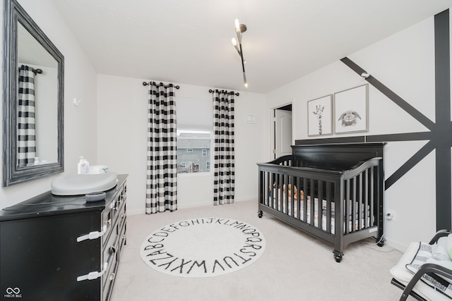 15598 Memorial Way, Fishers, IN 46037 - bedroom featuring light colored carpet and a nursery area