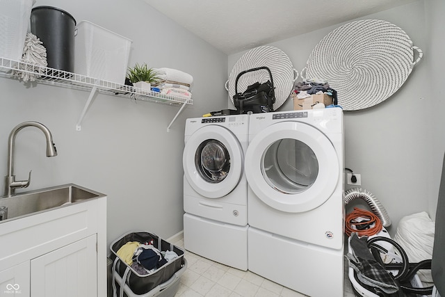 15598 Memorial Way, Fishers, IN 46037 - laundry area with washer and dryer and cabinet space