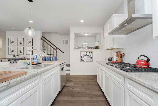 15598 Memorial Way, Fishers, IN 46037 - kitchen with wall chimney exhaust hood, stainless steel appliances, decorative backsplash, white cabinets, and dark wood finished floors