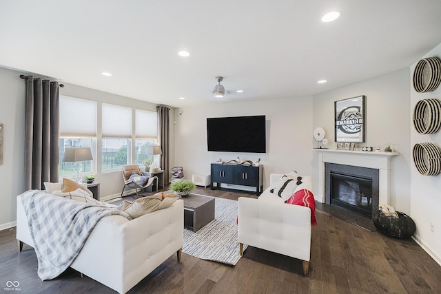15598 Memorial Way, Fishers, IN 46037 - living room featuring recessed lighting, dark wood-type flooring, and a glass covered fireplace