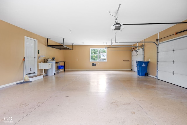 5695 N Red Oak Dr, Greenfield, IN 46140 - garage with a garage door opener and baseboards