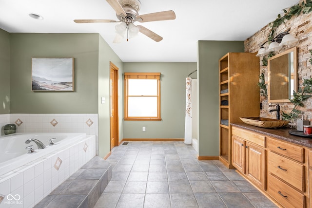 5695 N Red Oak Dr, Greenfield, IN 46140 - full bathroom featuring vanity, a bath, and ceiling fan