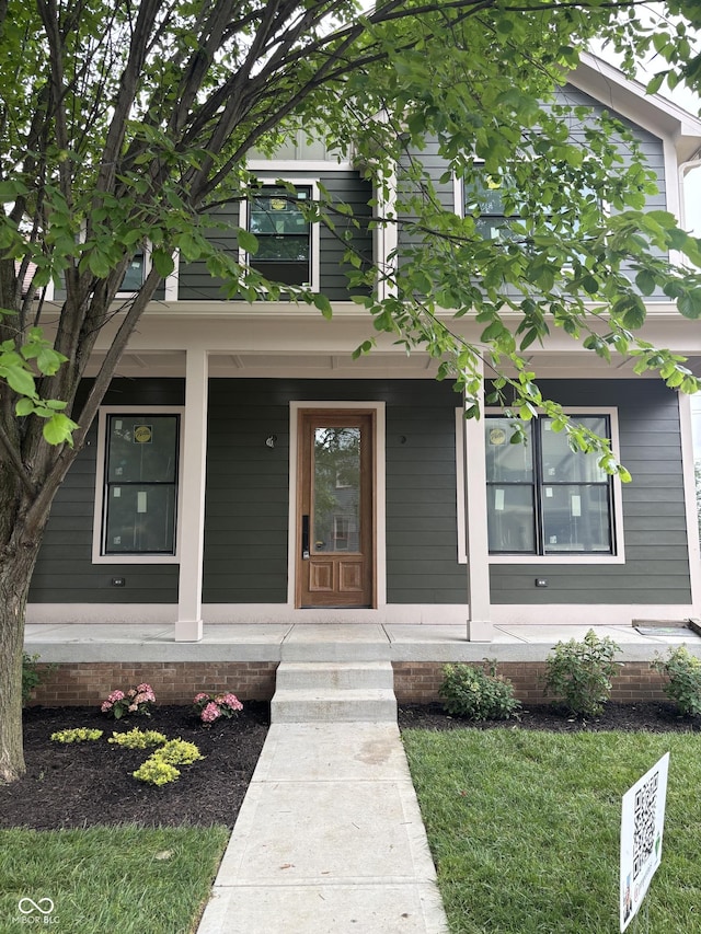 2148 N Pennsylvania St, Indianapolis, IN 46202 - property entrance featuring a porch