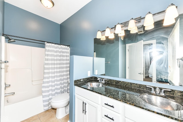 721 E N St Unit 2C, Indianapolis, IN 46202 - full bath with tile patterned flooring, double vanity, and shower / bath combo with shower curtain