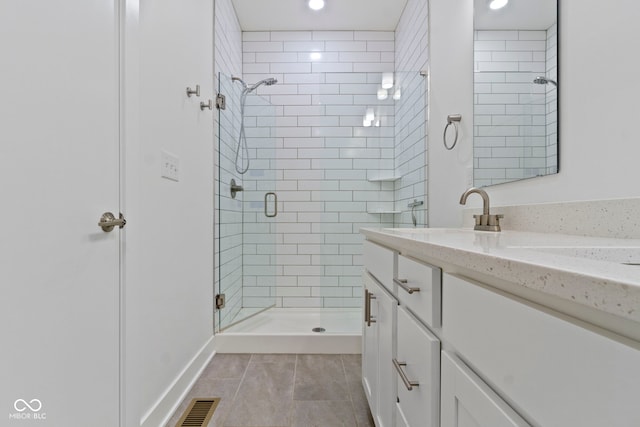 751 Switchyard Pl, Indianapolis, IN 46202 - bathroom with a shower stall, vanity, tile patterned flooring, and recessed lighting