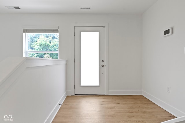 751 Switchyard Pl, Indianapolis, IN 46202 - entryway featuring light wood finished floors and baseboards