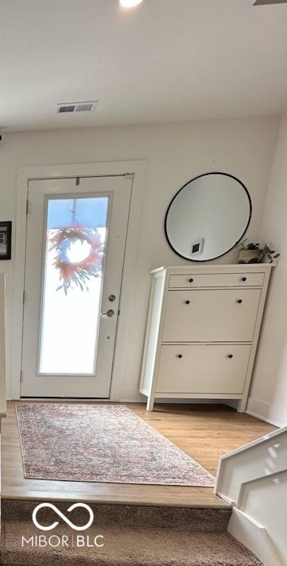751 Switchyard Pl, Indianapolis, IN 46202 - foyer entrance with light wood finished floors