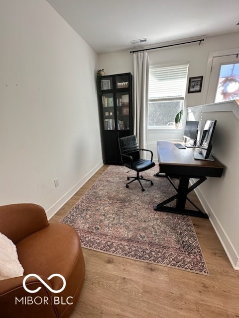 751 Switchyard Pl, Indianapolis, IN 46202 - office area featuring wood finished floors and baseboards