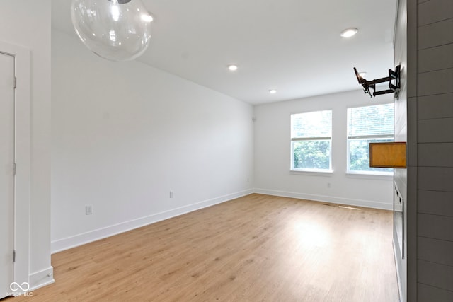 751 Switchyard Pl, Indianapolis, IN 46202 - unfurnished room with baseboards, light wood-style flooring, and recessed lighting