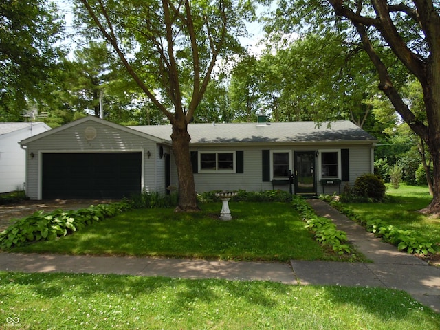 509 Eberhart Dr, Shelbyville, IN 46176 - single story home featuring a front yard, an attached garage, and driveway