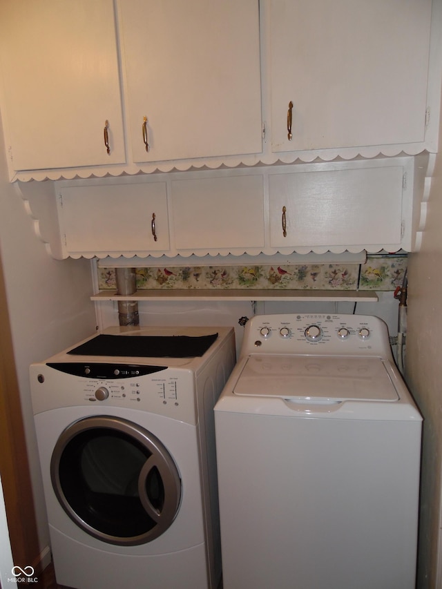 509 Eberhart Dr, Shelbyville, IN 46176 - washroom with cabinet space and washing machine and dryer