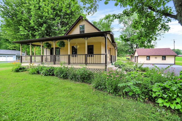 6644 Mcfarland Rd, Indianapolis, IN 46227 - view of front of home with a porch and a front yard