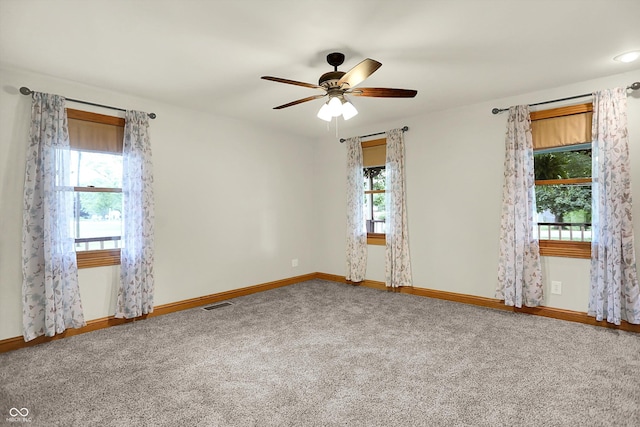 6644 Mcfarland Rd, Indianapolis, IN 46227 - unfurnished room featuring carpet and a ceiling fan