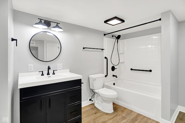 6644 Mcfarland Rd, Indianapolis, IN 46227 - full bath with wood finished floors, vanity, and shower / tub combination