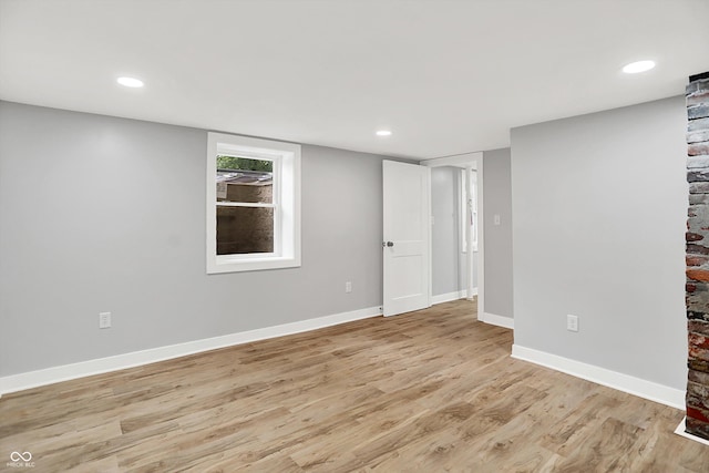 6644 Mcfarland Rd, Indianapolis, IN 46227 - unfurnished room featuring light wood-style flooring and recessed lighting