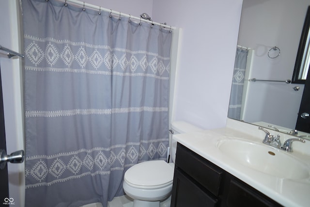 1673 W Integrity St, Greensburg, IN 47240 - full bathroom with toilet, vanity, and a shower with curtain