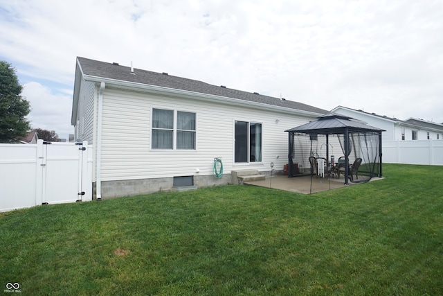 1673 W Integrity St, Greensburg, IN 47240 - back of property featuring a gazebo, a patio, and a gate