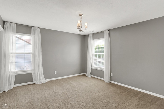 1343 Turfway Dr, Avon, IN 46123 - unfurnished room featuring a chandelier and carpet flooring