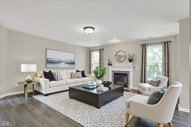 1343 Turfway Dr, Avon, IN 46123 - living area with dark wood-type flooring and a fireplace with flush hearth