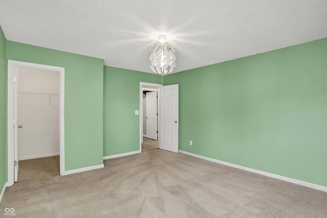 1343 Turfway Dr, Avon, IN 46123 - unfurnished bedroom with a spacious closet, carpet, and a closet