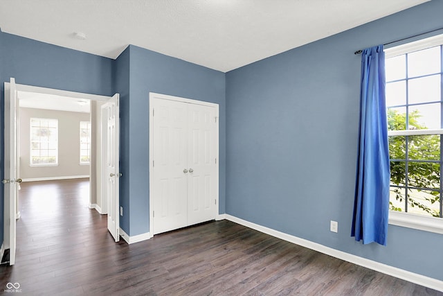 1343 Turfway Dr, Avon, IN 46123 - unfurnished bedroom featuring dark wood-style floors and a closet