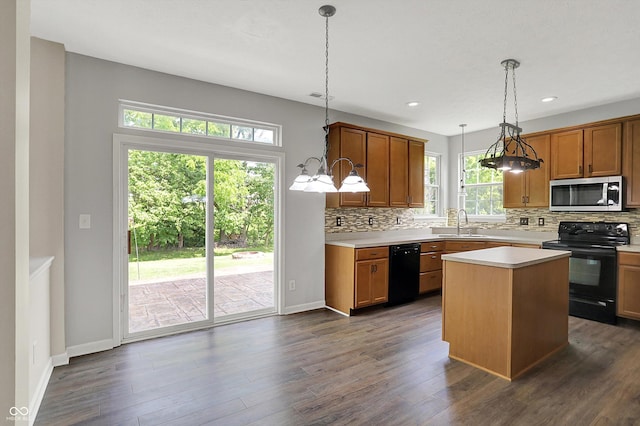 1343 Turfway Dr, Avon, IN 46123 - kitchen with black appliances, tasteful backsplash, healthy amount of natural light, light countertops, and recessed lighting