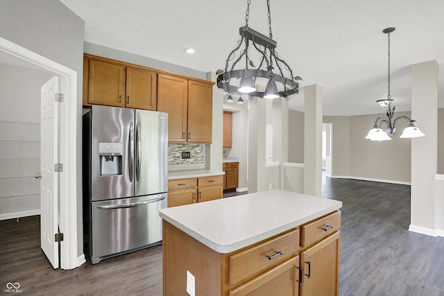 1343 Turfway Dr, Avon, IN 46123 - kitchen featuring stainless steel fridge, a chandelier, light countertops, dark wood-type flooring, and recessed lighting