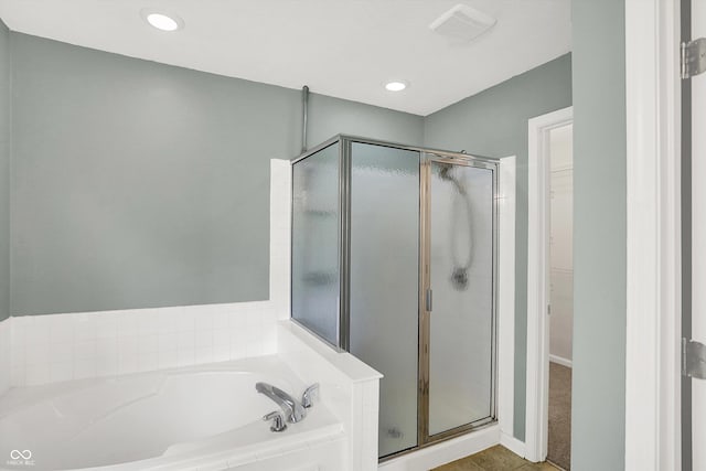 1343 Turfway Dr, Avon, IN 46123 - bathroom featuring a stall shower, a garden tub, a walk in closet, tile patterned flooring, and recessed lighting