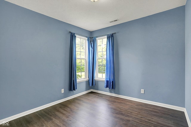 1343 Turfway Dr, Avon, IN 46123 - unfurnished room featuring dark wood-type flooring and a textured ceiling