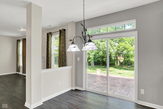 1343 Turfway Dr, Avon, IN 46123 - unfurnished dining area featuring dark wood finished floors and a chandelier