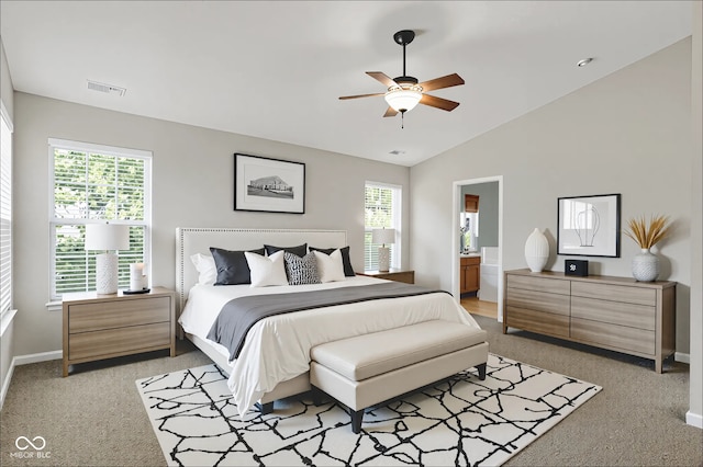 1343 Turfway Dr, Avon, IN 46123 - bedroom with multiple windows, light carpet, lofted ceiling, connected bathroom, and ceiling fan