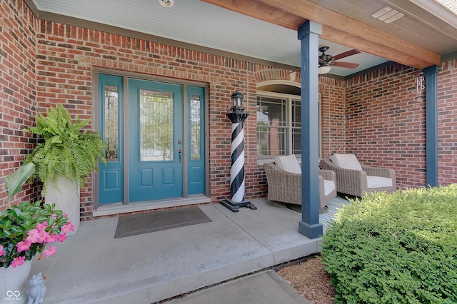 214 W Stoney Trl, Greenfield, IN 46140 - property entrance with ceiling fan and brick siding