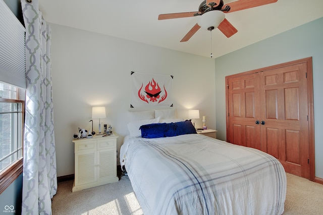 214 W Stoney Trl, Greenfield, IN 46140 - bedroom featuring light colored carpet, a closet, and ceiling fan