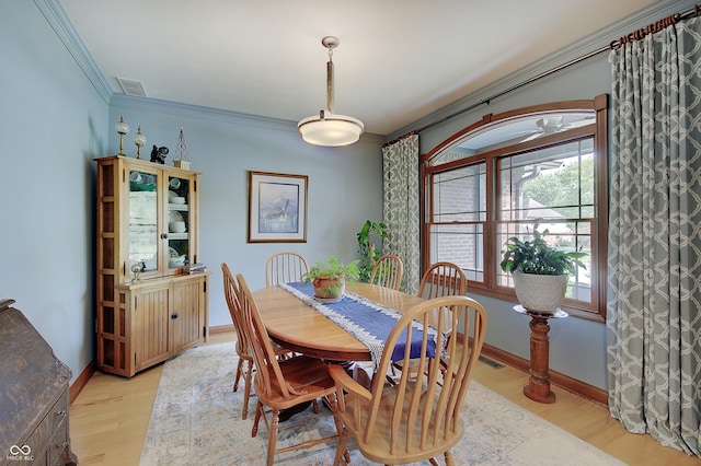 214 W Stoney Trl, Greenfield, IN 46140 - dining space featuring ornamental molding and light wood finished floors