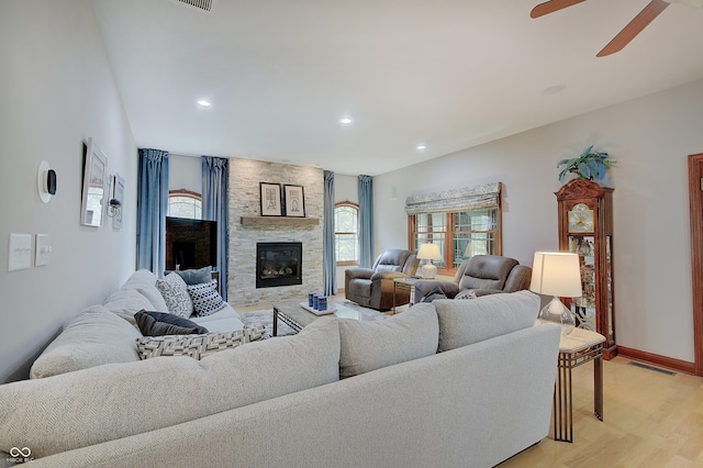 214 W Stoney Trl, Greenfield, IN 46140 - living area featuring a ceiling fan, a fireplace, light wood-type flooring, and recessed lighting