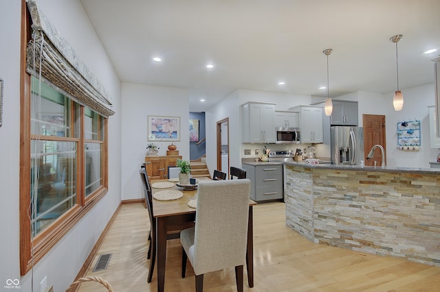 214 W Stoney Trl, Greenfield, IN 46140 - dining space featuring light wood-style floors and recessed lighting