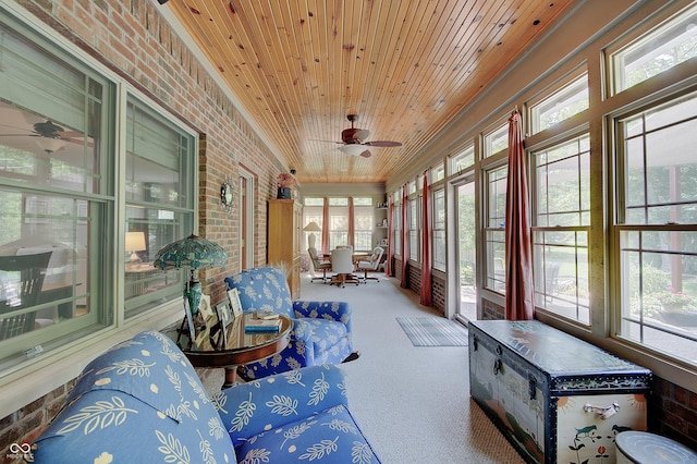 214 W Stoney Trl, Greenfield, IN 46140 - sunroom with brick wall, carpet flooring, wood ceiling, ceiling fan, and plenty of natural light
