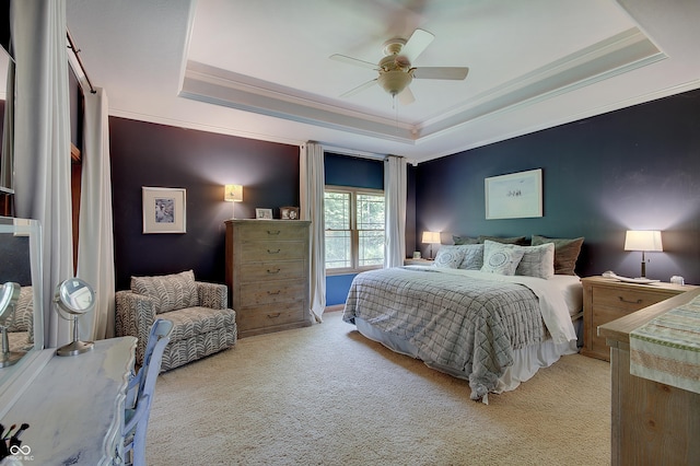 214 W Stoney Trl, Greenfield, IN 46140 - bedroom featuring a tray ceiling, ornamental molding, light carpet, and ceiling fan